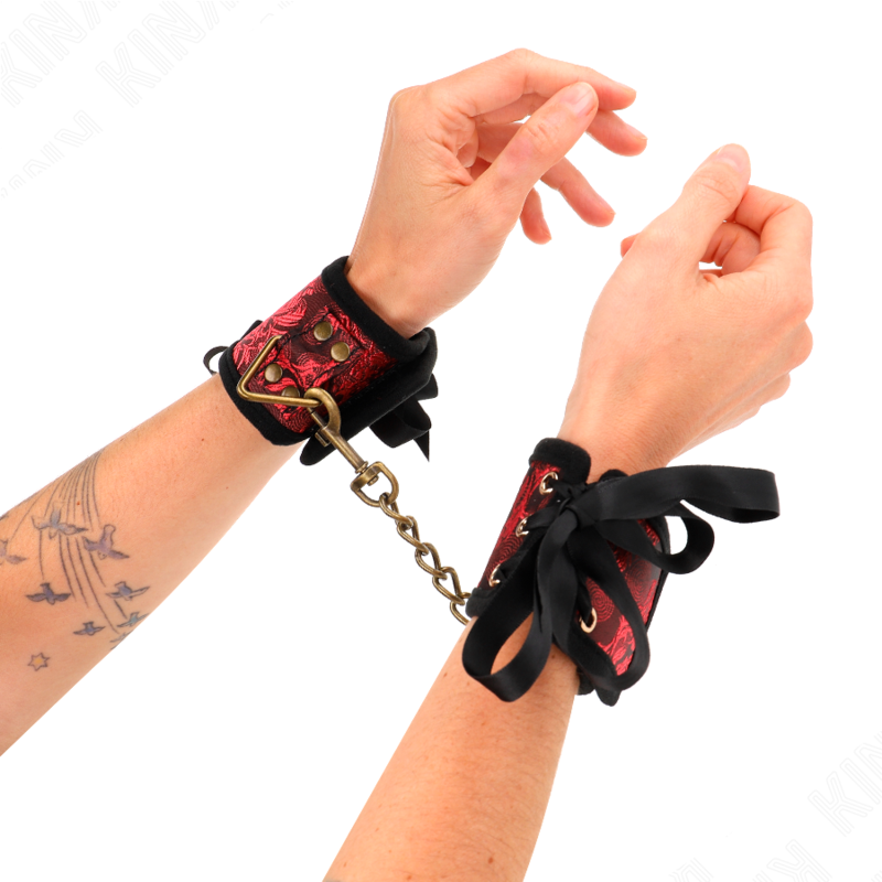 KINK - SCANDAL WRIST RESTRAINTS WITH RED-BLACK LACE DETAILS 24.5 CM X 6.5 CM